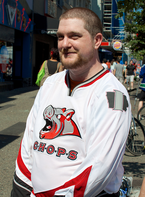 Ryan Mance in an awesome Iowa Chops jersey. That's right, the Des Moines AHL franchise was named for a cut of meat. (Ryan, on the other hand, was not.) Five Hole for Food held their annual finale on Granville Street in Vancouver on 20 July 2013. All Photos by Jason Kurylo for Pucked in the Head.