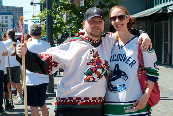 Ryan Mance wears Peyote Coyote with his fiancé Alix Wright in her Vancouver Orca jersey. Five Hole for Food held their annual finale on Granville Street in Vancouver on 20 July 2013.