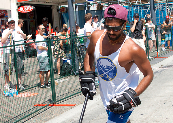A participant of Five Hole's Mining for Food industry challenge offers a barely-there Buffalo Sabres tank top. Photo by Jason Kurylo for Pucked in the Head.