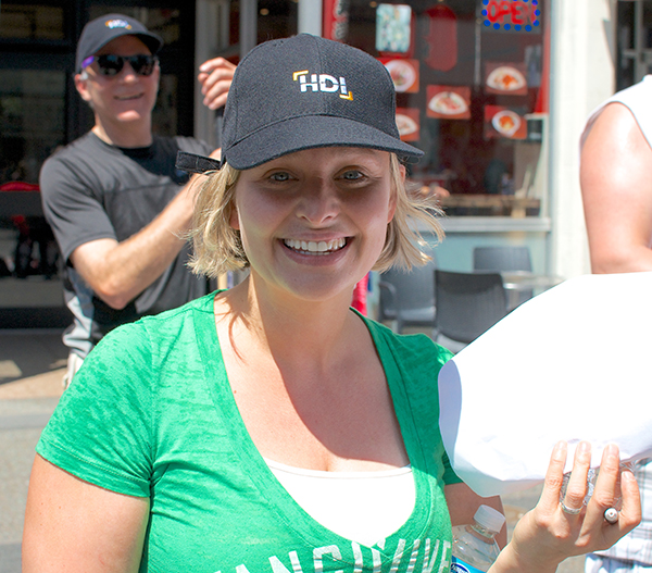 All smiles in a Vancouver Canucks baby T. Photo by Jason Kurylo for Pucked in the Head.