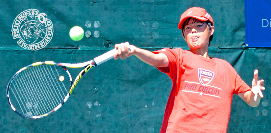 This ballboy took advantage of some open courts on the final day of the 2014 Vancouver Open tennis tournament. Photo by Jason Kurylo for Pucked in the Head.