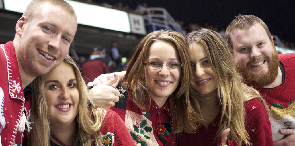These beautiful Aussies were some of the most vocal ugly sweater wearers at a 2012 Giants game — we at PITH challenge you to outdo them this year! Photo by Jason Kurylo for Pucked in the Head.