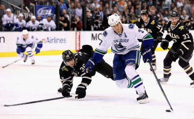 Canucks defenseman Kevin Bieksa took a page out of his Glenn Anderson playbook, swinging wide around Dallas Stars blueliner Philip Larsen before scoring the 2-2 goal in a 4-3 Canucks win. Photo ripped unceremoniously from www.canucks.com