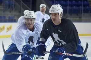 Vancouver Canucks forward Maxim Lapierre skates against his defensive teammate Andrew Alberts during two-on-two drills during a January 8, 2013 practice at UBC's Thunderbird Arena. Photo by Jason Kurylo for Pucked in the Head.