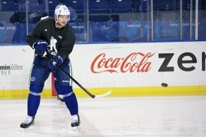 Vancouver Canucks defenseman Alex Edler takes part in saucer passing drills during a practice on January 8, 2013. Photo by Jason Kurylo for Pucked in the Head.