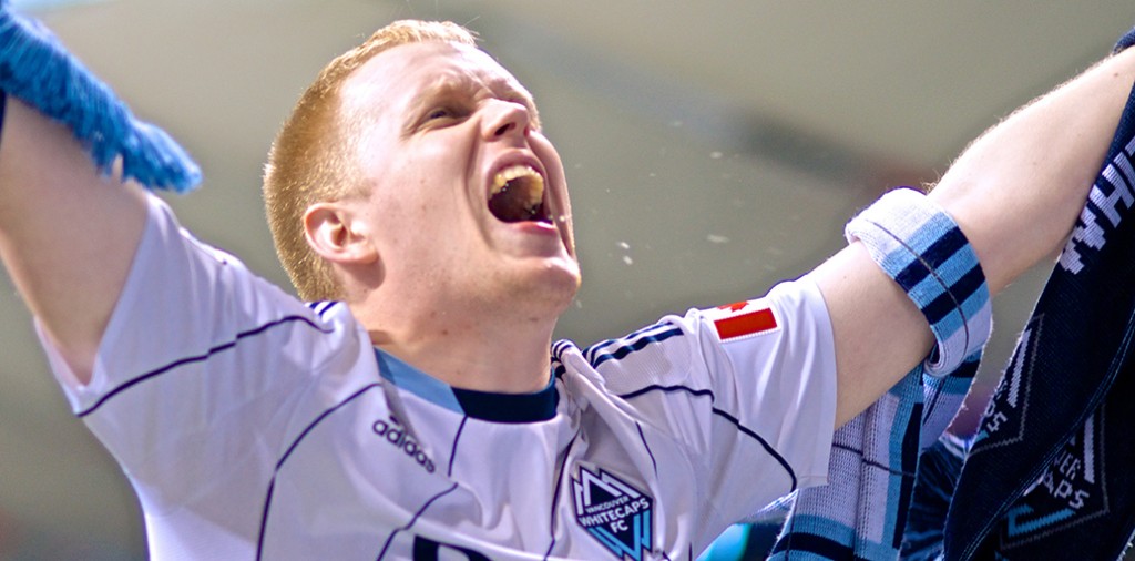 Kristjan Aug leads Southsiders in chant, cheer and song during a 2-2 draw between the Whitecaps and LA Galaxy. Photo by Jason Kurylo for Pucked in the Head.