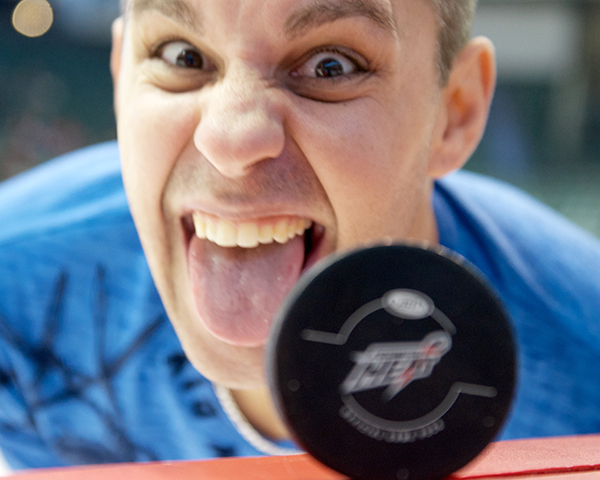 Abbotsford Heat photographer Clint Trahan is, like, sooooo serious all the time. It's a drag just being around the guy. Sheesh. Photo by Jason Kurylo for Pucked in the Head.