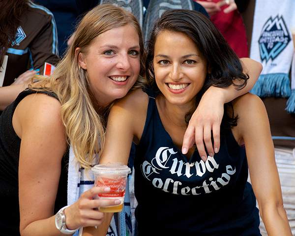 Two Curva Collective supporters group members beam with joy as their Vancouver Whitecaps FC defeat the San Jose Earthquakes 2-nil at BC Place. Photo by Jason Kurylo for Pucked in the Head.