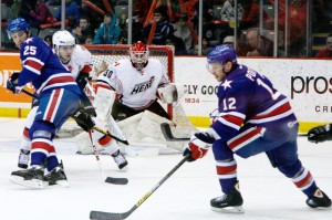 Abbotsford Heat goaltender tracks a puck through traffic during a 3-2 win over the Rochester Americans on February 5, 2013. Photo by Jason Kurylo for Pucked in the Head.