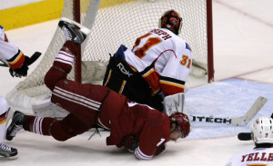 Shane Doan displays perfect form as he slips a shot between the legs of Curtis Joseph. Photo squirmed away from the interweb.