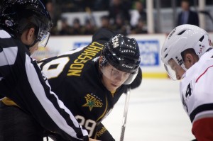 Carter Bancks of the Abbotsford Heat faces off against Alex Chiasson of the Texas Stars in AHL action on December 15, 2012. Photo by Jason Kurylo for Pucked in the Head.