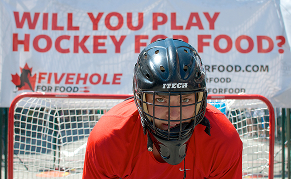 Five Hole for Food raised over 135 metric tonnes of food for regional food banks this year alone. Along the way, thousands of participants played ball hockey in downtown locales across Canada. Photo by Jason Kurylo for Pucked in the Head.