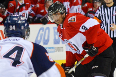 Vancouver Giants defenseman Arvin Atwal lines up a point shot while sporting a commemorative #9 Gordie Howe Mr Hockey jersey. Atwal had an assist in the Giants 4-1 win over the Seattle Thunderbirds on February 25, 2013. Photo by Jason Kurylo for Pucked in the Head.