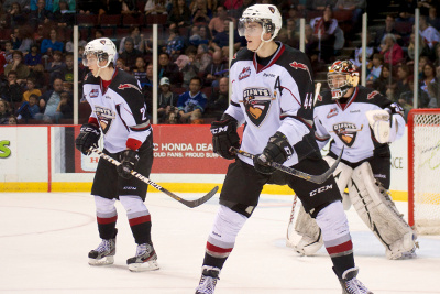 Defensemen Mason Geertsen (#44) and Brett Kulak (#2) stand in front of goaltender Jared Rathjen during the final weekend of WHL action. Photo by Jason Kurylo for Pucked in the Head.