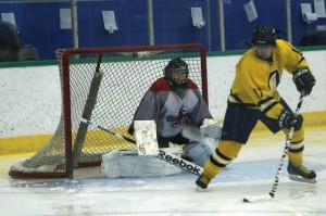 Is there anything more breathtaking - at any level of hockey - than a player who goes mano-a-mano* with the goaltender? Photo by Jason Kurylo for Pucked in the Head* Or womano-a-womano! We're definitely not trying to pull a rangers.com on you ladies!