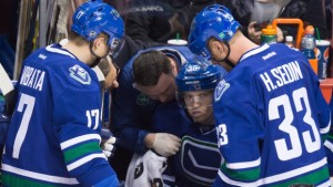 Jannik Hansen collapsed briefly after a clean hit by Dennis Wideman, and was kept off the ice for the rest of the pre-Xmas schedule. Photo purloined from an online source.