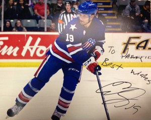 Rochester Americans forward and Buffalo Sabres prospect Cody Hodgson was kind enough to sign an 8x10 of a shot I took the night before. Photo of a Jason Kurylo photo for Pucked in the Head by Jason Kurylo for Pucked in the Head. Whoa. Meta.