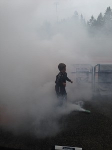 A young Caps fan celebrates amid the smoke after Vancouver drew level in the first half of Saturday's U-18 tilt. Photo by Chris Withers.