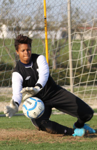 Keeper Karina Leblanc blocks a shot during Team Canada training. Photo courtesy of Soccer Canada.