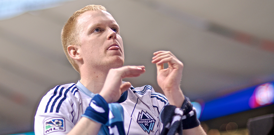 Whitecaps fans are licking their lips at the prospect of first kick. Photo of capo extraordinaire Kristjan Aug by Jason Kurylo for Pucked in the Head.