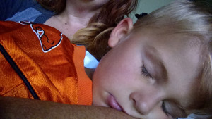 The kid takes a halftime nap, but it's not enough to get him through the end of the game. Selfie courtesy of Erin Jeffery.