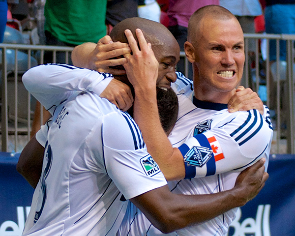 Kenny Miller attempts to rip Nigel Reo-Coker's head off, while NRC re-enacts a scene from the Lost Boys with Russell Teibert's head. No animals were harmed in the making of this photo by Jason Kurylo for Pucked in the Head.