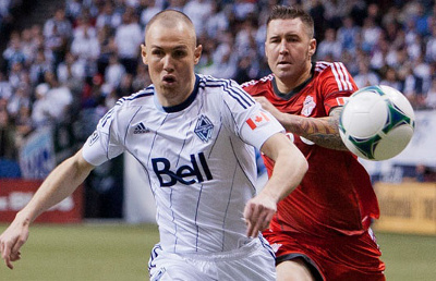 Many pundits suggested that Kenny Miller would not start the 2013 season with  Vancouver Whitecaps FC, but there he was in the starting 11, and taking the captain's armband after Jay DeMerit injured his Achilles'. Photo copped from www.whitecaps.com