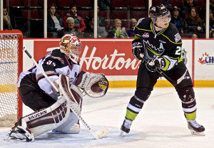 Edgars Kulda of the Edmonton Oil Kings looks for a tip in front of Vancouver Giants goaltender Cody Porter. Photo by Jason Kurylo for Pucked in the Head.