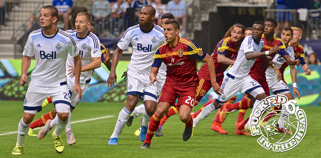 And they're off! The Vancouver Whitecaps FC and RSL look for the business end of a Pedro Morales free kick. Photo by Jason Kurylo for Pucked in the Head.