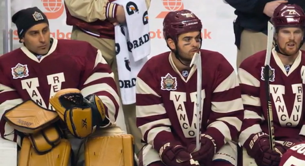 Roberto Luongo, Tom Sestito and Daniel Sedin in Vancouver Millionaires heritage uniforms.