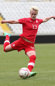 Team Canada midfielder Sophie Schmidt crosses the ball during international friendly action against the Republic of Ireland. Photo courtesy of Soccer Canada.