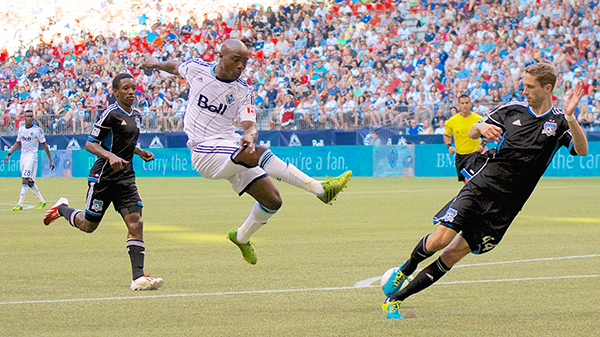 Sa-WING, batta! Nigel Reo-Coker misses a cross from Russell Teibert, but does it so acrobatically that we can't really complain. (Plus the ball went straight to Kenny Miller, who put it into the back of the net.) Photo by Jason Kurylo for Pucked in the Head.