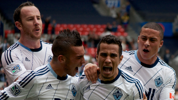 Camilo de Sanvezzo (second from right) gave the Whitecaps FC their first-ever lead against the Portland Timbers, but it was negated in the second half by a dubious penalty call. Photo by Jason Kurylo for Pucked in the Head.