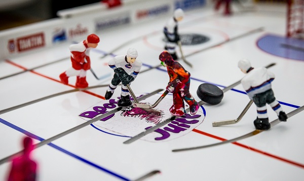 Furious action at centre ice on the Booster Juice table during the Vancouver Table Hockey Extravaganza on 20-21 September 2013. Photo by Clint Trahan/ShutterDreams.