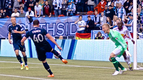 Whitecaps FC David Ousted: "Andy, if you don't mind, would you please make an effort to direct that errant regulation-sized football over there near the nice folks in row 23?" Photo by Jason Kurylo for Pucked in the Head.