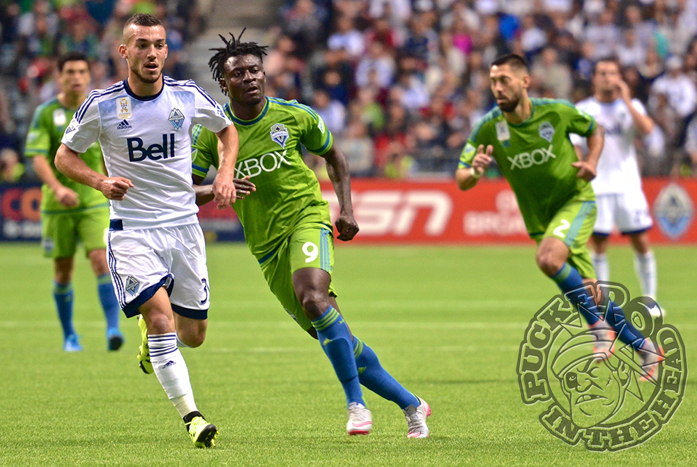 Russell Teibert keeps a close eye on Obafemi Martins during MLS action at BC Place. Photo by Jason Kurylo for Pucked in the Head.