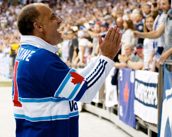 Carl Valentine leads a chant in front of the Curva Collective during MLS play on 15 June 2013. Photo by Jason Kurylo for Pucked in the Head.