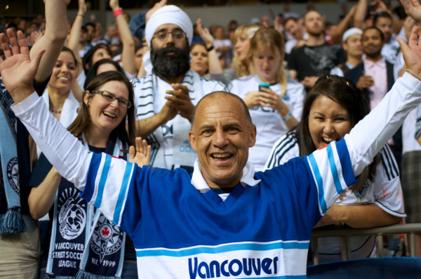 Carl Valentine donned a vintage Whitecaps jersey to hang with the Curva Collective during MLS action on 15 June 2013. Photo by Jason Kurylo for Pucked in the Head.