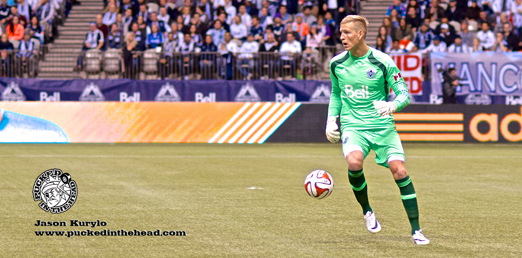 Whitecaps FC keeper David Ousted looks to move the ball upfield during a 4–1 win over the New York Red Bulls in the 2014 season opener. Photo by Jason Kurylo for Pucked in the Head.