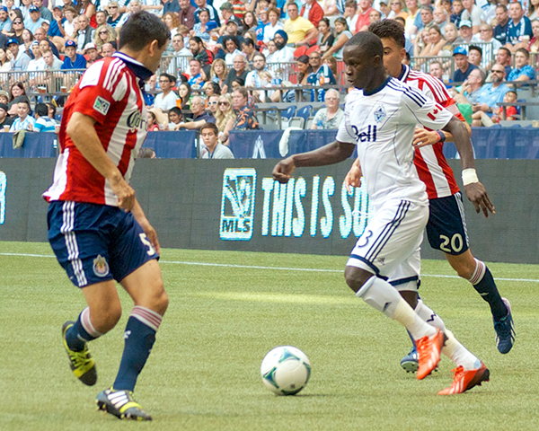 Whitecaps FC midfielder Kekuta Manneh often attempts low-percentage passes or dribbling into double coverage when a safe outlet pass would serve the team better. Photo by Jason Kurylo for Pucked in the Head.