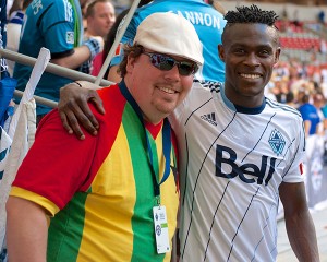 Vancouver Southsiders mainstay Chris Withers introduces Gershon Koffie to his new #28 Ghana national jersey. Vancouver Whitecaps FC defeated Chicago Fire 3-1 on 14 July 2013 on the strength of two goals by Camilo da Silva Sanvezzo. Photo by Jason Kurylo for Pucked in the Head.