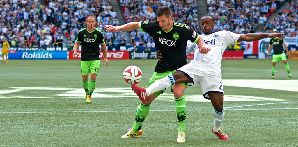 Nigel Reo-Coker battles for the ball versus the Seattle Sounders.