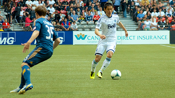 YP Lee carries the ball downfield during a 1-0 loss to the LA Galaxy at BC Place on 24 August 2013. Photo by Jason Kurylo for Pucked in the Head.