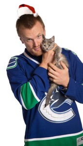 Can't. Handle. The Cuteness. (Or is that the catness? That reminds me, how is that new Hunger Games flick?) Photo snicked from canucks.com.
