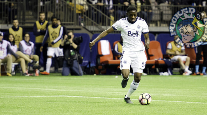 Alfonso Davies moves the ball upfield.